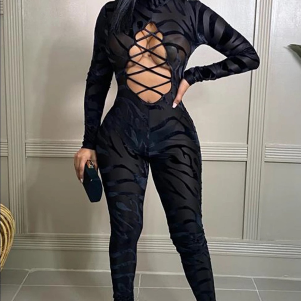 Touchdolls Super Sexy Transparent Jumpsuit with Front Cutouts Size M